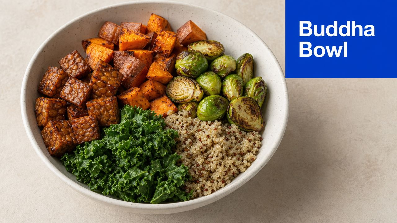 A healthy Buddha bowl featuring roasted sweet potatoes, tempeh, fresh kale, Brussels sprouts, and fluffy quinoa.