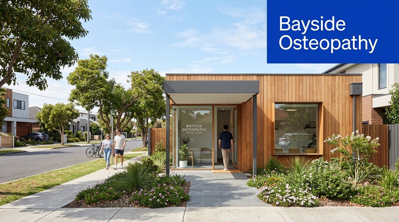A modern Bayside Osteopathy clinic building featuring wooden exterior siding and lush landscaping along a quiet street.