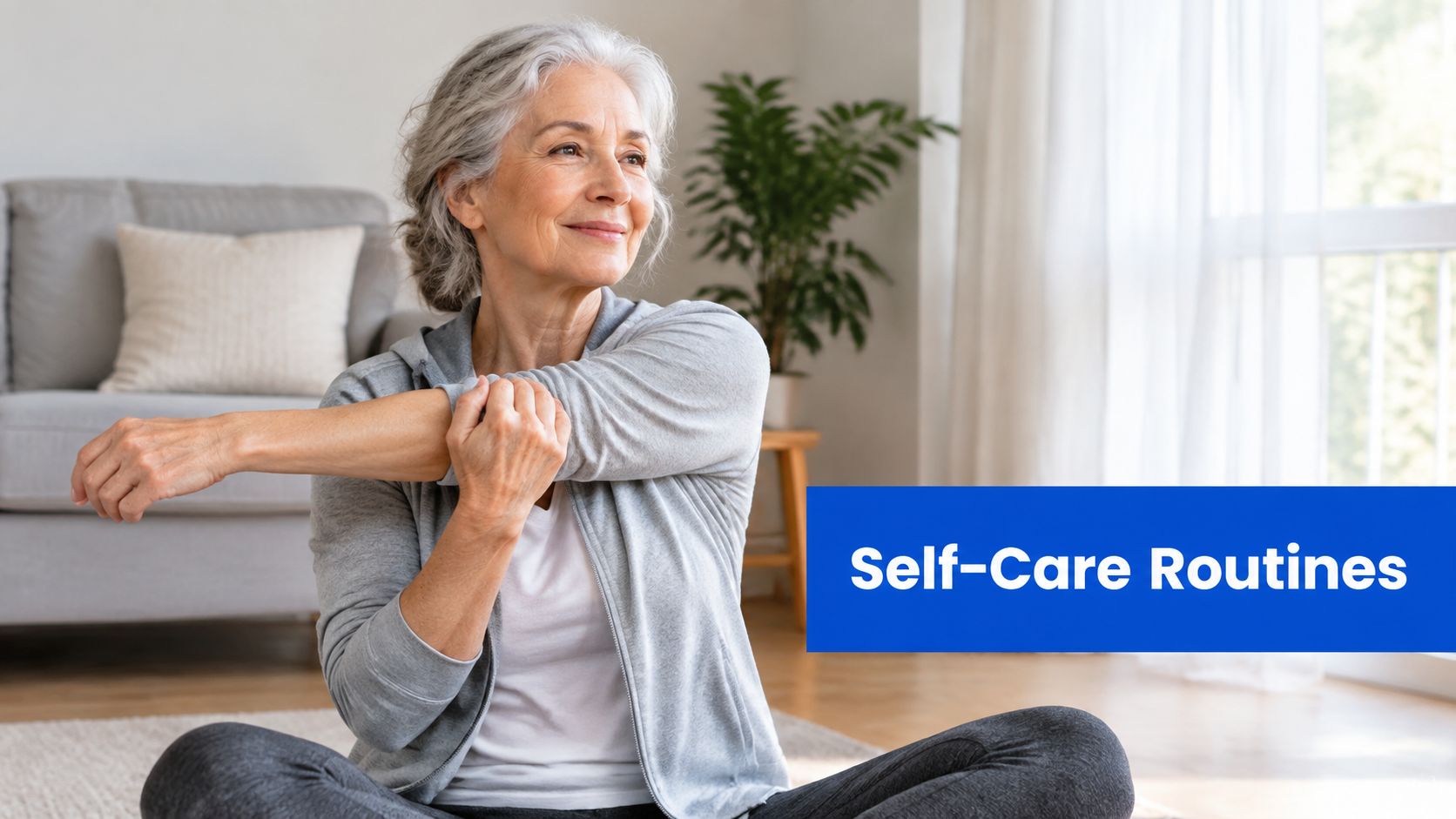 A serene senior woman practicing arm stretching exercises on the floor for wellness and self-care routine.
