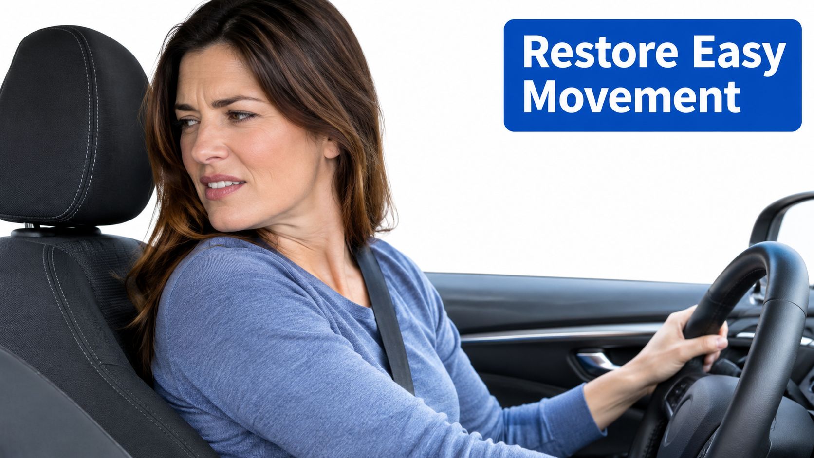 A woman driving a car struggling to turn her head, representing limited neck mobility and discomfort.